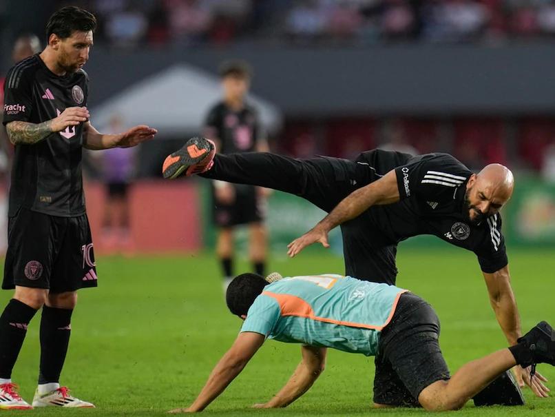 Failed Attempt: Lionel Messi's $3 Million-A-Year Bodyguard Unable to Prevent Pitch Invader from Hugging Superstar Mid-Match. Video Goes Viral.